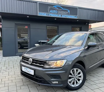 VW Tiguan 2,0 TDI ⭐ Navi, PDC, Tempomat, Grij. sjed. ⭐ - cover