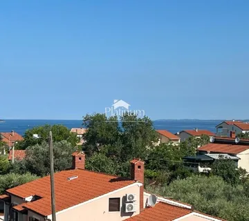 Istra, Štinjan, trosobni apartman na mansardi s pogledom - cover