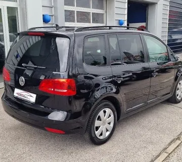 VW Touran 1,6 TDI - 140.000km - SERVISNA - NAVI - REG 1 GOD !!! - cover