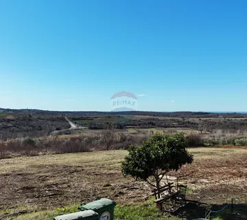 Istra,Buje-Građevinsko zemljište s prekrasnim pogledom na more  - cover