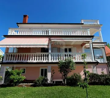 MALINSKA-dva stana i velika okućnica na prodaju - cover