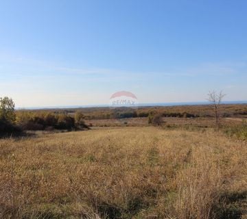 Istra, građevinsko zemljište od 1300 m2 na atraktivnoj lokaciji sa pogledom na more - cover