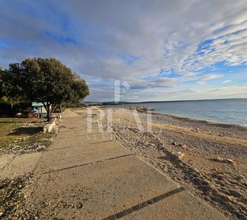 Zemljište 1.red do mora T1 zona,5000 m2 - cover