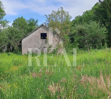 Građevinsko zemljište u Raduču s dva objekta  2050 m2 - cover