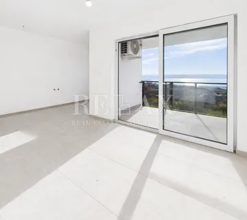 Povile - dvosoban stan s pogledom na more, novogradnja - cover