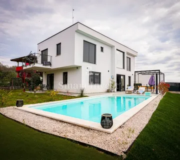 UMAG, moderna kuća s bazenom blizu mora - cover
