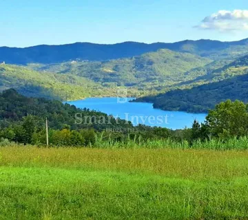 MOTOVUN, VRH, GRAĐ. ZEMLJIŠTE S POGLEDOM NA BUTONIGU 1630 M2 - cover