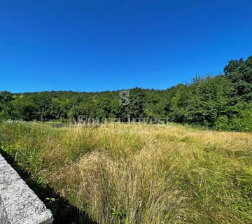 MATULJI, zemljište od 402 m2 s djelomičnim pogledom na more - cover