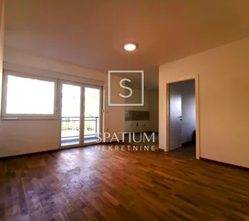 LOVRAN, JEDNOSOBNI STAN S PARKINGOM U NOVOGRADNJI - cover