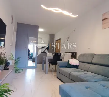 Umag, namješten stan 1s+db, novogradnja, parking - cover