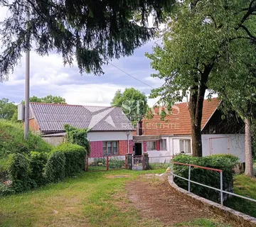 Ogulin -prizemnica 97 m² s voćnjakom i pomoćnim objektima, 1.871 m² parcela - cover