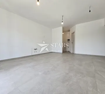 Buzet, 1S+DB stan u novogradnji, centar - cover