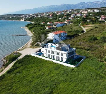 Luksuzni apartman sa bazenom i vrtom prvi red do mora Rtina, prizemlje ( Ražanac) - cover
