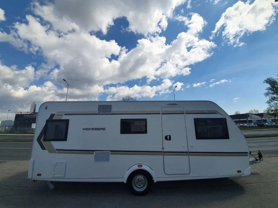 NOVA KAMP PRIKOLICA WEINSBERG CaraOne 550QDK - "TVORNIČKO JAMSTVO" - cover