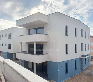 Novogradnja u centru Novalje, stan 60,21 m2, prizemlje, vrt, 225.787 € - cover