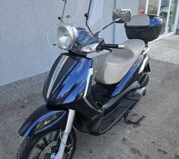 Piaggio Beverly Tourer 250, 2009 god.  - cover