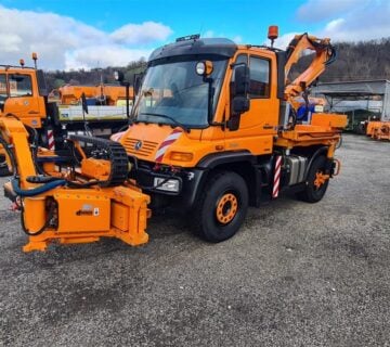 Unimog U400 2011. g. sa malčerima Ducker RMS13 i Mulag MHU800 - cover