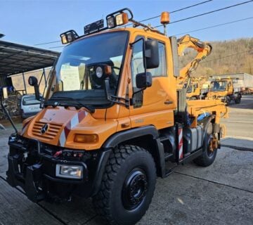 Unimog U400 2012.g. sa malčerom Mulag MHU 800 - cover