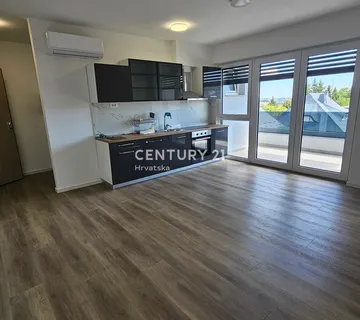 Ivanec – Centar | Dvosobni stan 48,33 m² + lođa 8,30 m² | 1. kat | Novogradnja | Ključ u ruke | Pogled na Ivanščicu