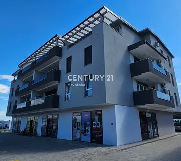 Ivanec – Centar | Trosobni stan 57,26 m² + lođa 5,81 m² + spremište 8,09 m² | 1. kat | Novogradnja | Ključ u ruke | Pogled na Ivanščicu