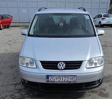 VW Touran 2.0 TDI 100 kw, 311000 km 6 brzina, može obročno plaćanje - cover