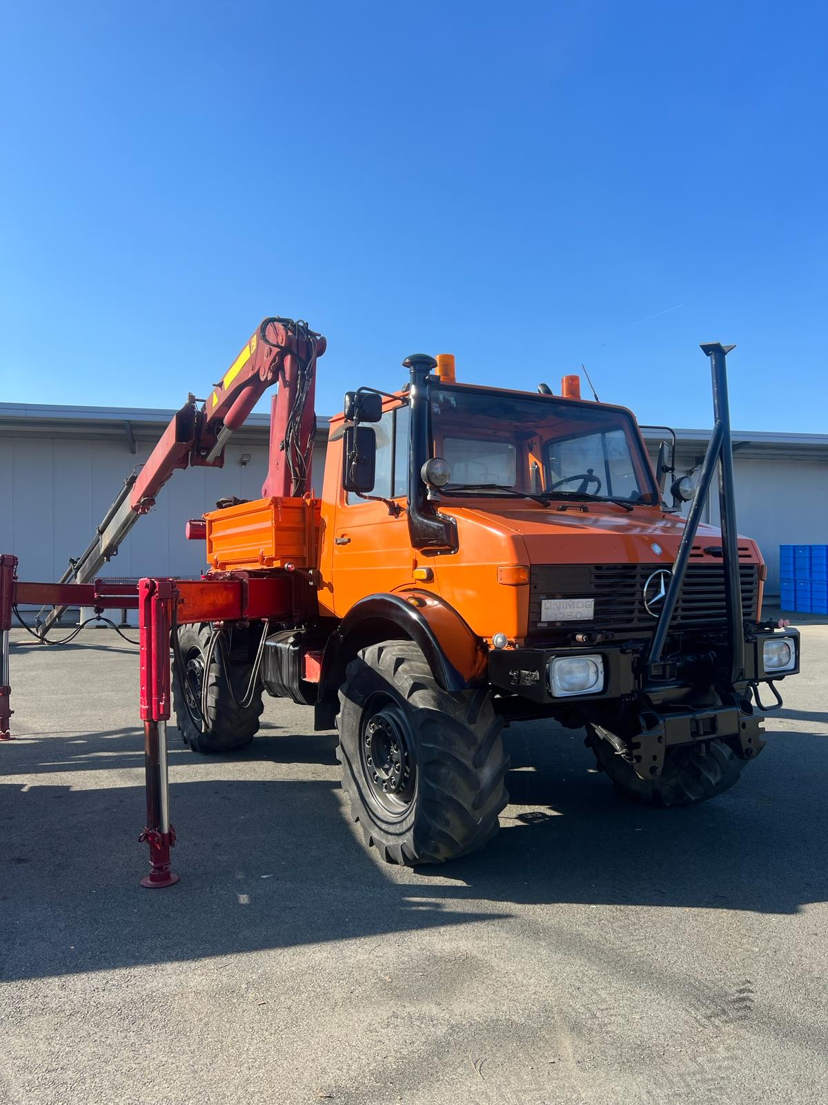 Mercedes Unimog 1750 + dizalica Palfinger - cover