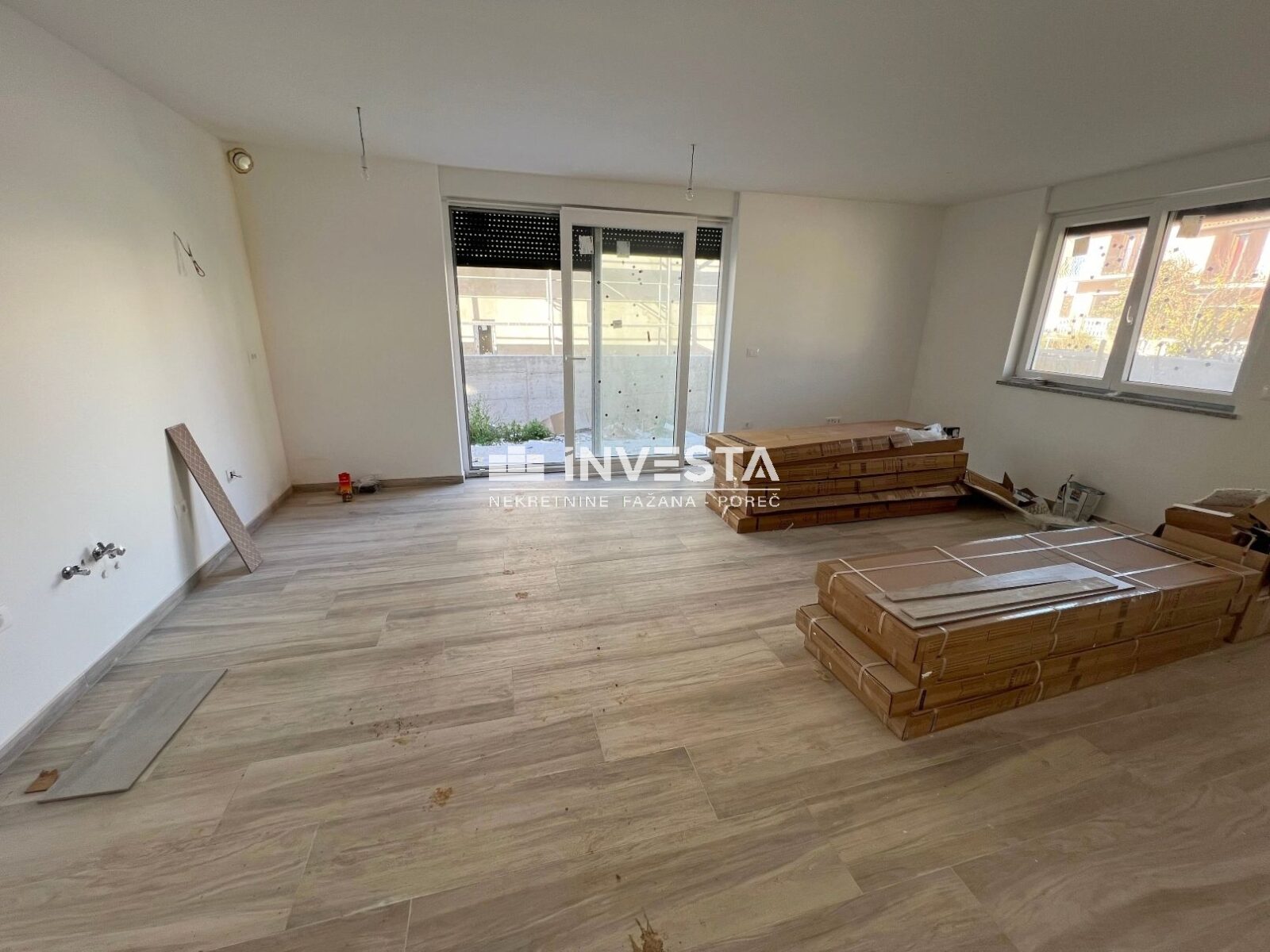 Medulin, dvosobni stan u prizemlju novogradnje s okućnicom od 90 m2 - cover