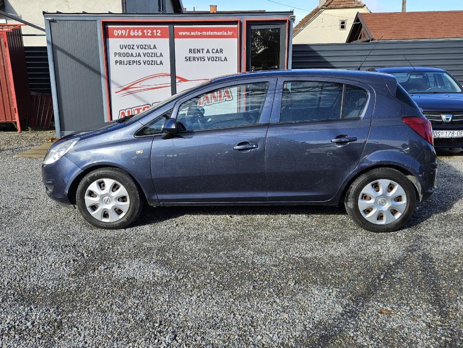 Opel Corsa 1,2 16V - cover