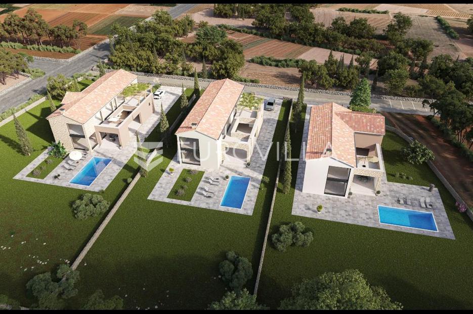 Istra, Momjan, građevinsko zemljište s projektom za 3 vile - cover