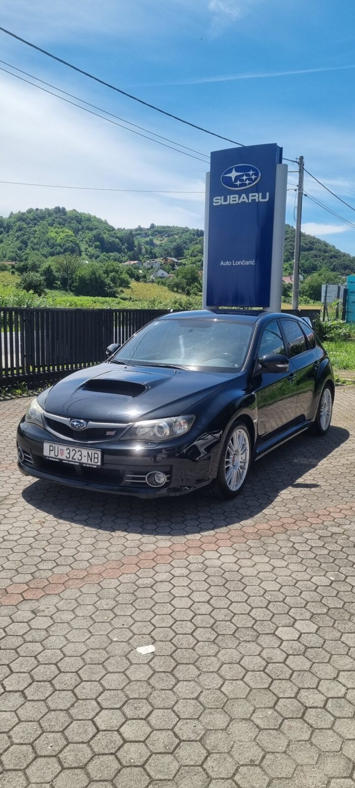 Subaru Impreza 2,5 WRX STI - cover