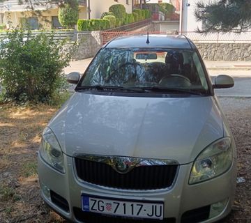 Škoda Roomster - cover