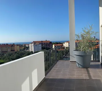 Luksuzan stan u Peroju blizu plaže s otvorenim pogledom na more i na Nacionalni park prirode Brijuni - cover