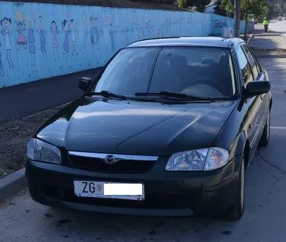 mazda 323 s 1.5i 2000. god, klima, registrirana do 2027. - slika 2