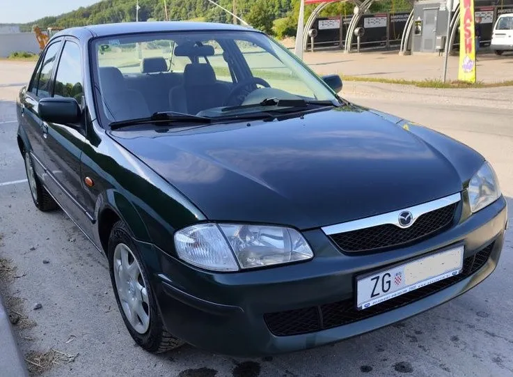 mazda 323 s 1.5i 2000. god, klima, registrirana do 2027. - slika 6