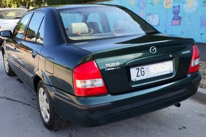 mazda 323 s 1.5i 2000. god, klima, registrirana do 2027. - slika 7
