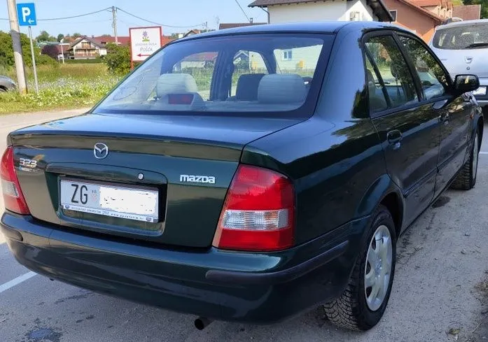 mazda 323 s 1.5i 2000. god, klima, registrirana do 2027. - slika 8