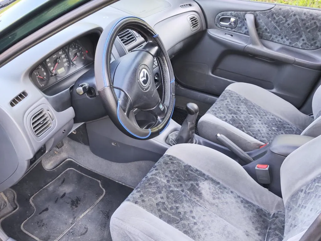 mazda 323 s 1.5i 2000. god, klima, registrirana do 2027. - slika 10