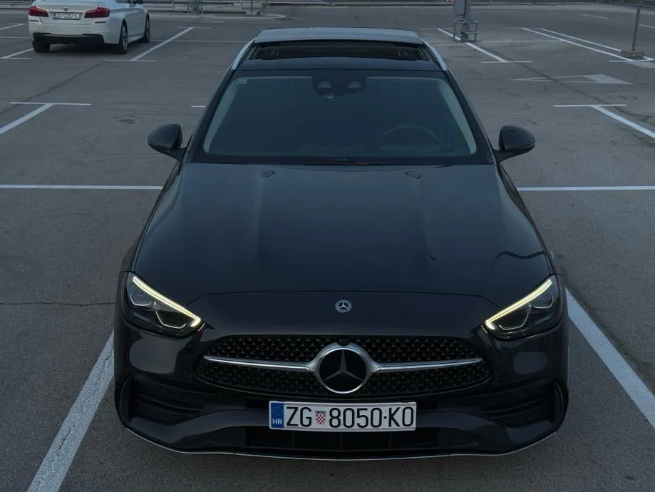 mercedes-benz c200d t amg line *pano, vrhunsko stanje, 2 seta kotača* - slika 2