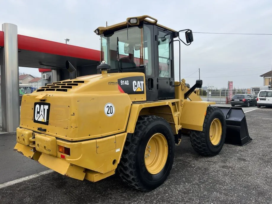 utovarivač cat 914g - slika 7