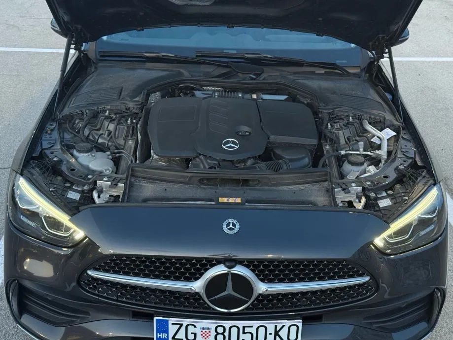 mercedes-benz c200d t amg line *pano, vrhunsko stanje, 2 seta kotača* - slika 19