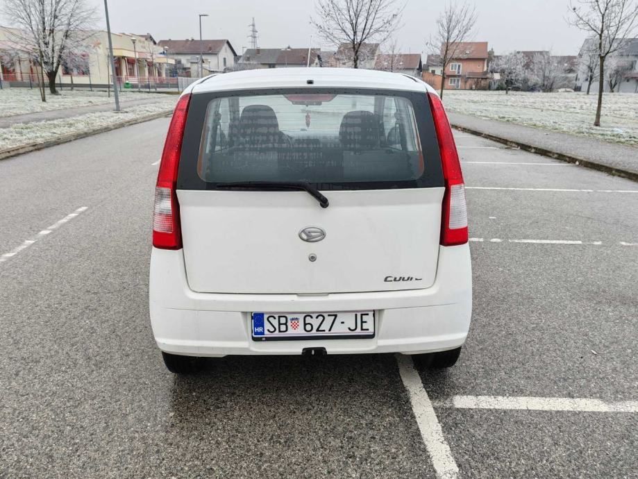 daihatsu cuore 1.0 benzin 2004 god reg 25.10 .2025 - slika 5