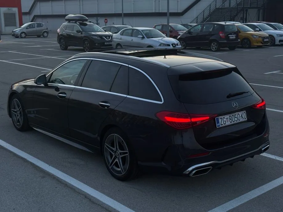 mercedes-benz c200d t amg line *pano, vrhunsko stanje, 2 seta kotača* - slika 7