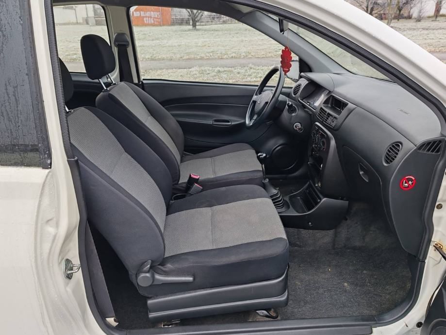 daihatsu cuore 1.0 benzin 2004 god reg 25.10 .2025 - slika 8