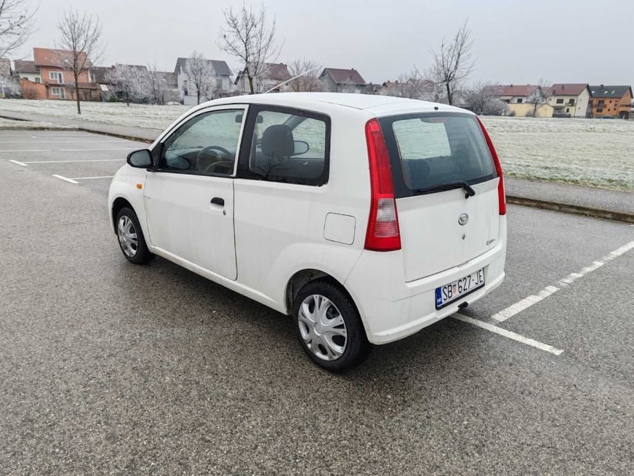 daihatsu cuore 1.0 benzin 2004 god reg 25.10 .2025 - slika 6
