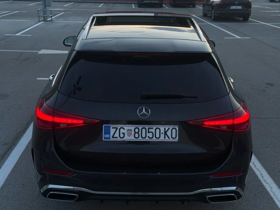 mercedes-benz c200d t amg line *pano, vrhunsko stanje, 2 seta kotača* - slika 6