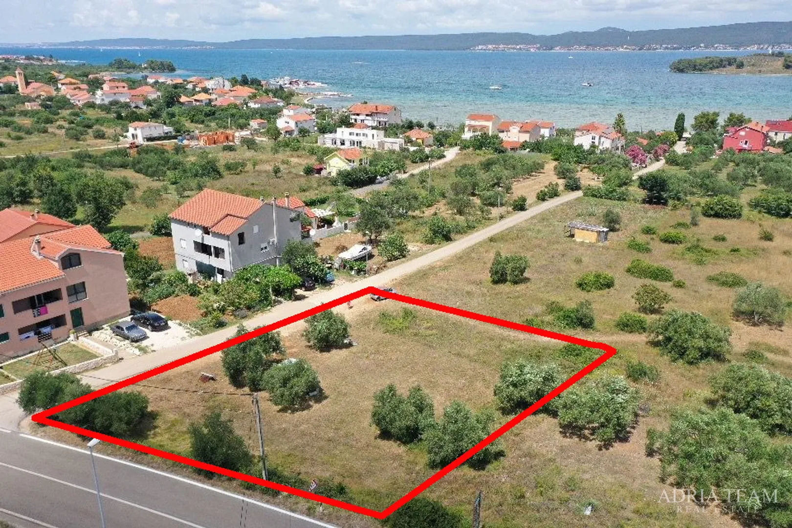GRAĐEVINSKO ZEMLJIŠTE S POGLEDOM NA MORE, 200 m OD MORA, MRLJANE - PAŠMAN - Mali Pašman, Pašman