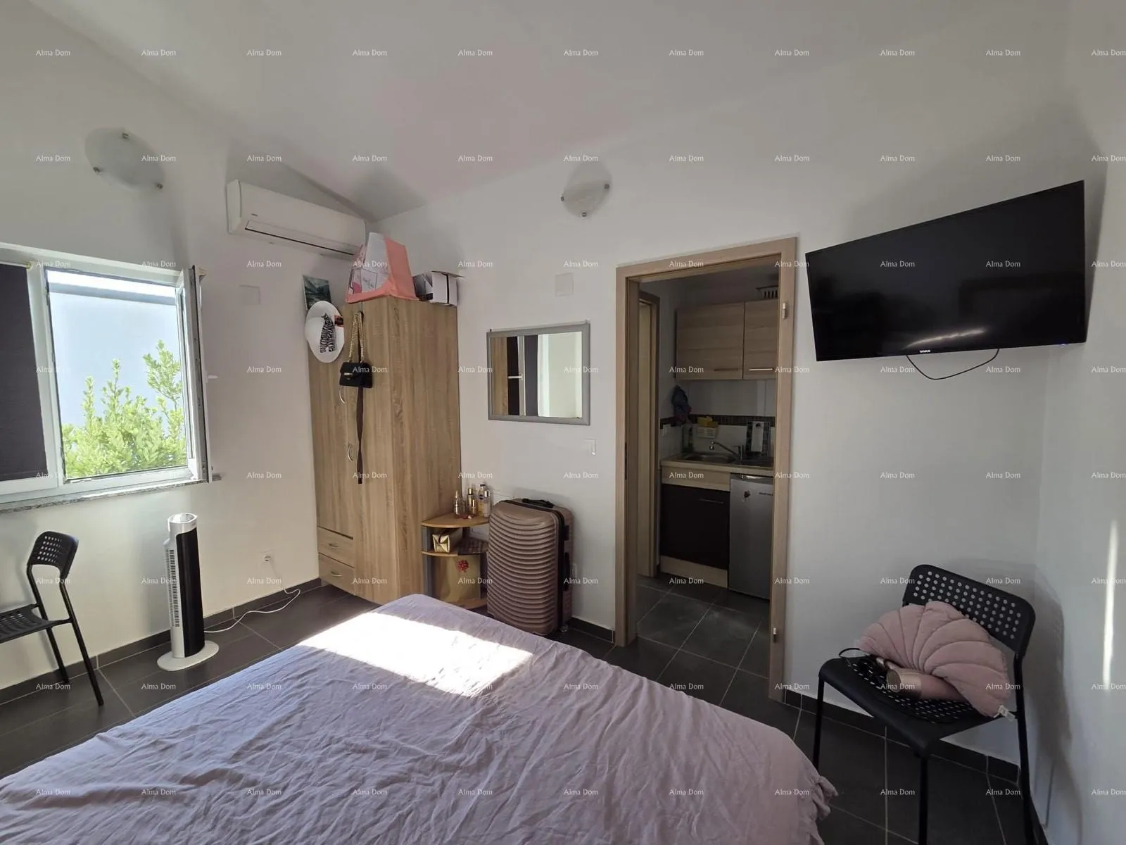 stan štinjan – dva apartmana u istoj zgradi - slika 18