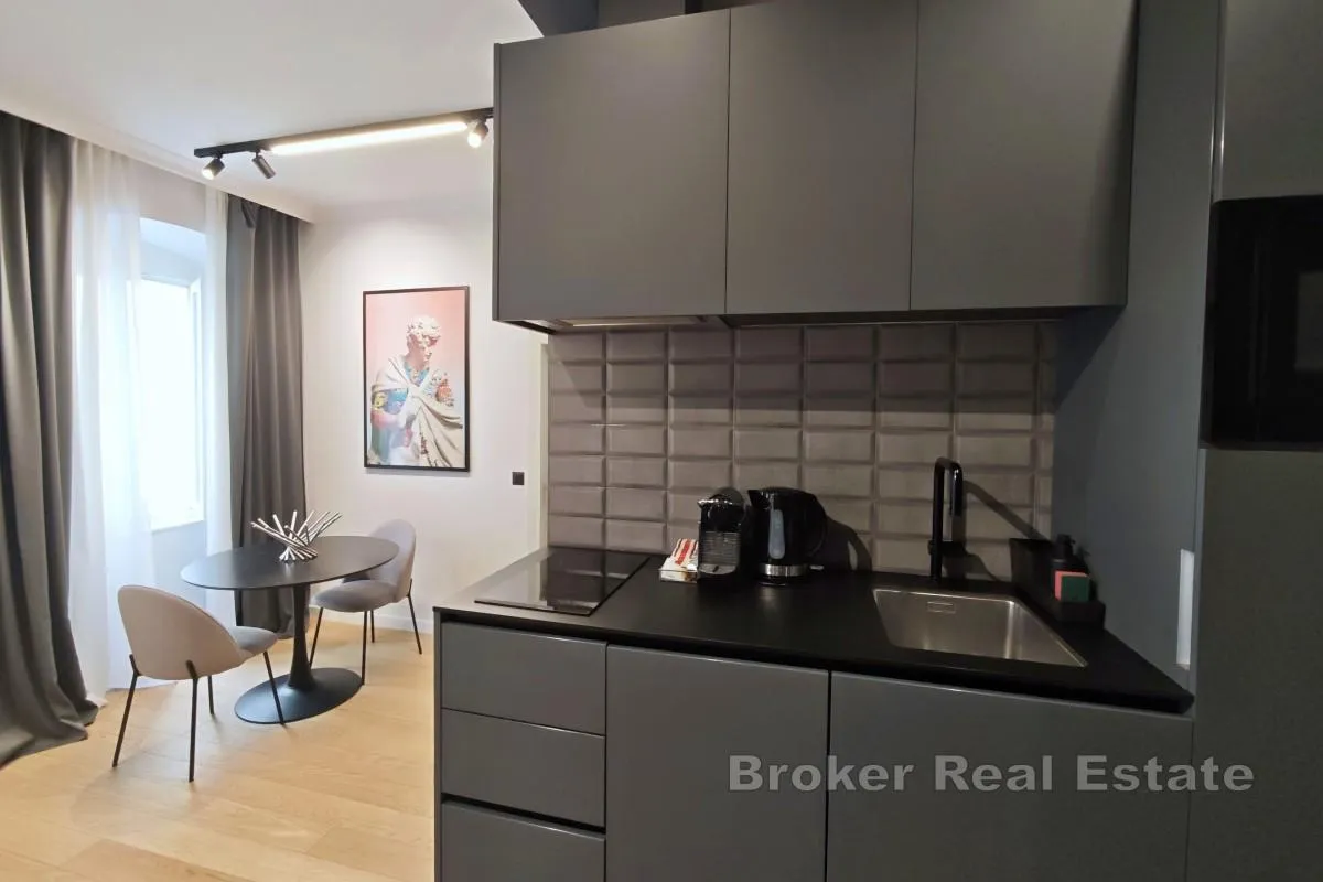 uhodane apartmanske jedinice u centru grada - slika 13