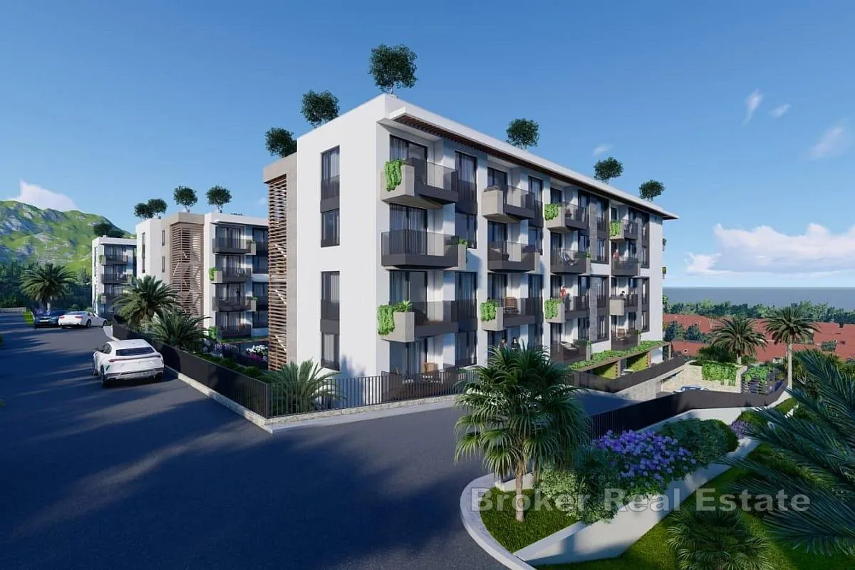 Atraktivan dvosoban apartman u novogradnji s djelomičnim pogledom na more - Makarska