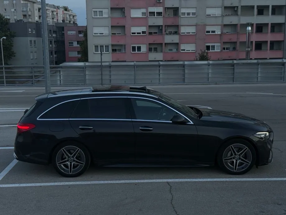 mercedes-benz c200d t amg line *pano, vrhunsko stanje, 2 seta kotača* - slika 4